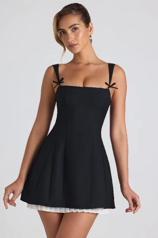 Hurry! While Supplies Last!Bow-Detail Pleated A-Line Mini Dress in Black